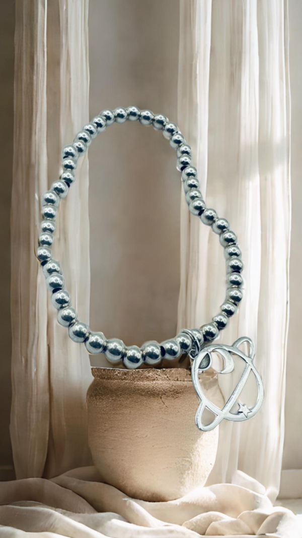 Pulsera bolitas con dije espacio